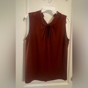 Pair of Sleeveless Office Blouses